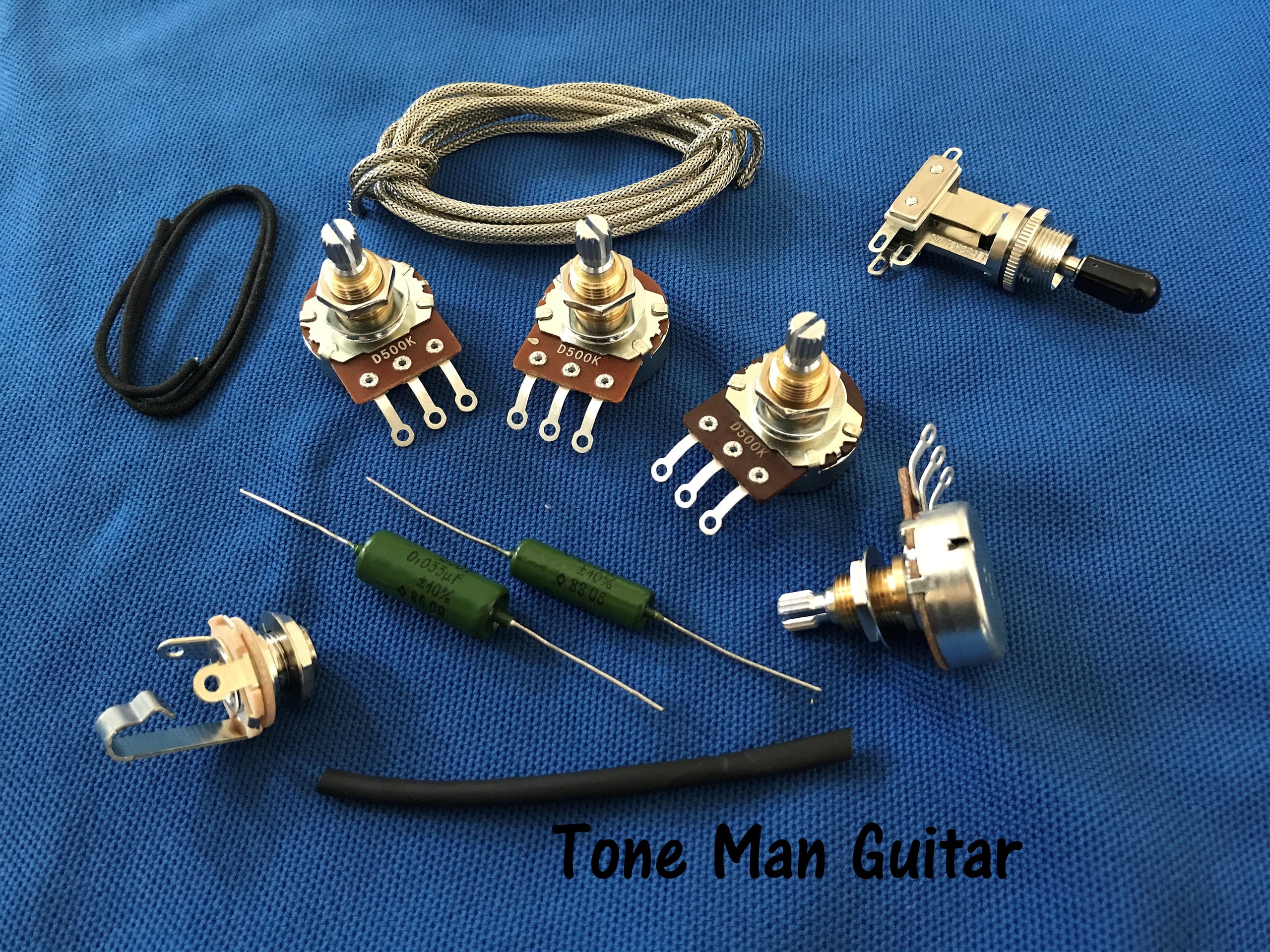 Les Paul wiring harness shaft pots PIO tone caps Tone Man Guitar